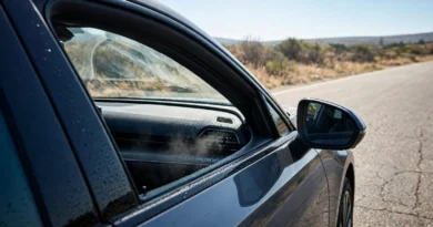 Car under summer heat illustrating air-conditioning fuel use