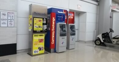 Airport currency exchange and ATM area for comparing exchange costs