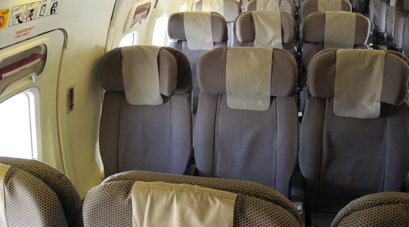 Airplane economy seats for a budget airline versus full-service airline comparison