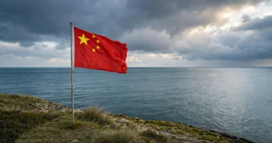 Chinese flag overlooking open sea representing South China Sea developments