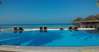 Resort swimming pool for an article about hotel resort fees and all-in pricing