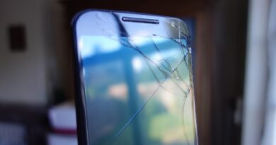Cracked smartphone screen for an article about whether phone insurance is worth it