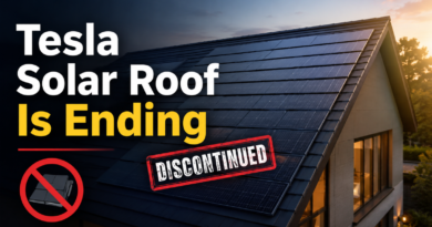 Tesla Solar Roof tiles on a modern home marked as discontinued