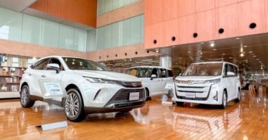 Toyota vehicles in a dealership showroom